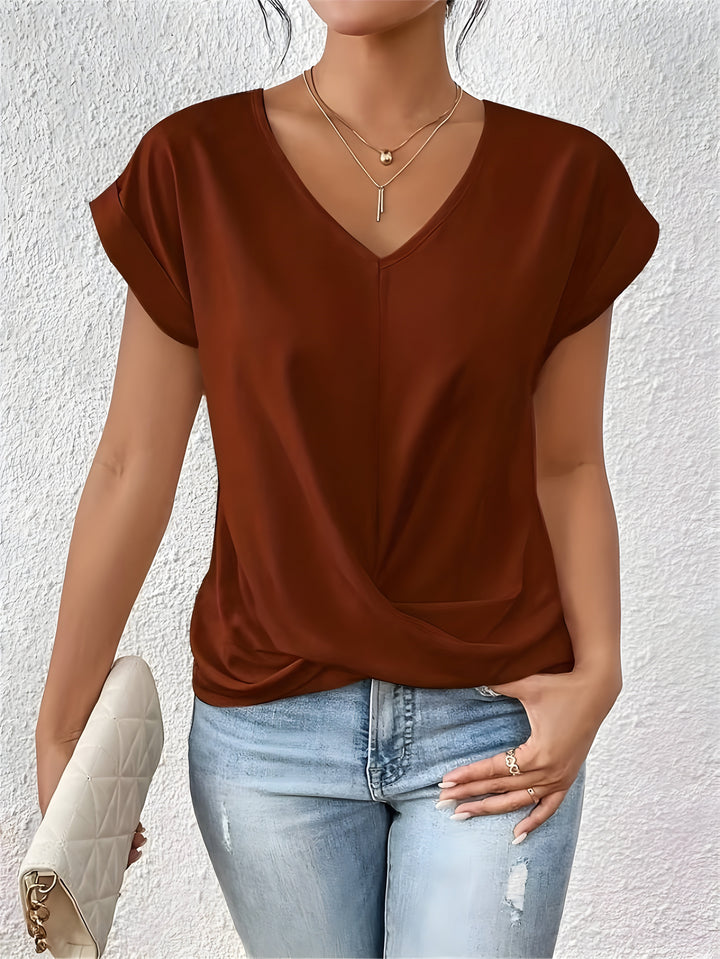 MEIKA™ – Haut col V à torsade classique