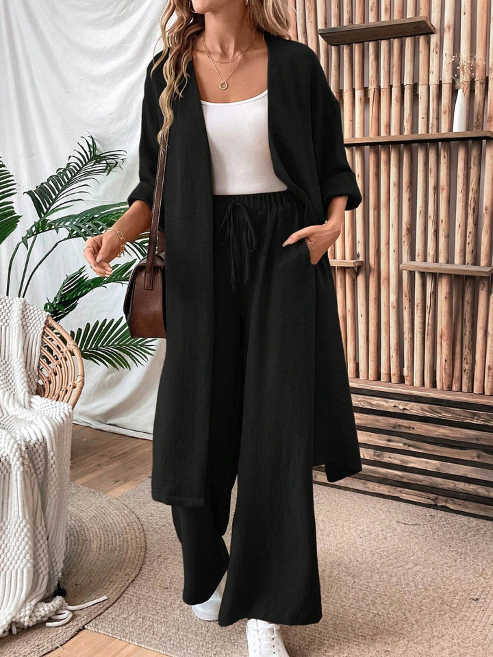 Ensemble gilet et pantalon ample aspect lin, style minimaliste et confortable