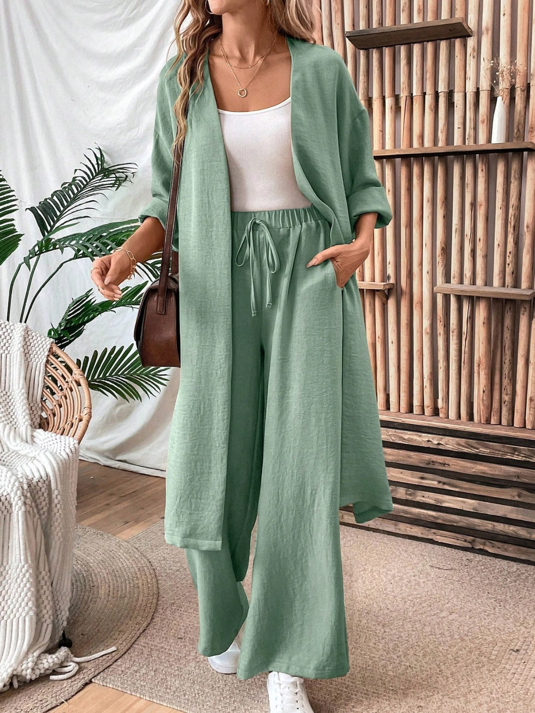 Ensemble gilet et pantalon ample aspect lin, style minimaliste et confortable
